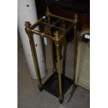 EARLY 20TH CENTURY BRASS SQUARE-SHAPED FOUR DIVISION STICK STAND.