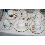 SIX ASSORTED LATE 19TH/ EARLY 20TH CENTURY HAND-PAINTED FLORAL DECORATED CUPS AND SAUCERS,