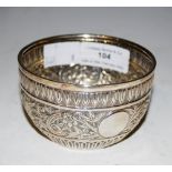 LONDON SILVER BOWL WITH EMBOSSED DECORATION OF FLOWERS AND STYLISED FOLIAGE, 2.3 TROY OZ.