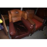 TWO SIMILAR LEATHER AND LEATHERETTE UPHOLSTERED CLUB ARMCHAIRS.
