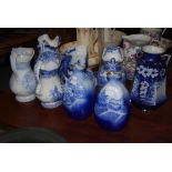 FIVE ASSORTED 19TH CENTURY BLUE PRINTED WASH EWERS, TOGETHER WITH AN ART NOUVEAU STYLE BLUE AND