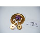 LATE 19TH CENTURY YELLOW METAL OVAL BROOCH, CENTRED WITH FACET CUT AMETHYST COLOURED OVAL STONE,