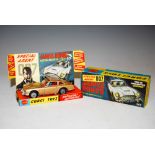 A CORGI TOYS MODEL 261 JAMES BOND ASTON MARTIN DB5 FROM THE FILM 'GOLDFINGER', GOLD BODY WITH RED