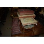A 19TH CENTURY MAHOGANY AND NEEDLEWORK UPHOLSTERED X-FRAME STOOL, TWO OTHER SMALLER STOOLS, A