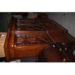 A 19TH CENTURY MAHOGANY BREAKFRONT BOOKCASE OF SMALL PROPORTIONS, THE UPPER SECTION WITH ASTRAGAL