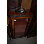 A 19TH CENTURY WALNUT, EBONY AND BOXWOOD LINED PIER CABINET WITH SINGLE GLAZED CUPBOARD DOOR