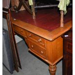 A 19TH CENTURY OAK KNEEHOLE DESK WITH RECTANGULAR TOP OVER CENTRAL FRIEZE DRAWER FLANKED BY TWO