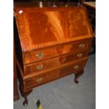 REPRODUCTION MAHOGANY FALL-FRONT BUREAU FITTED WITH THREE DRAWERS, TOGETHER WITH A REPRODUCTION