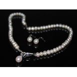 FRESHWATER PEARL AND DIAMOND NECKLACE WITH PEAR-SHAPED FRESHWATER PEARL PENDANT HANGING FROM A