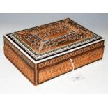 A LATE 19TH CENTURY ANGLO-INDIAN RECTANGULAR SHAPED CASKET WITH CARVED DECORATION OF BUILDINGS AND