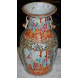 LATE 19TH CENTURY FAMILLE ROSE CANTON PORCELAIN VASE DECORATED WITH PANELS OF FIGURES, 33CM HIGH.