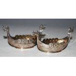 PAIR OF NORWEGIAN STERLING SILVER LONGBOAT SHAPED SALTS.