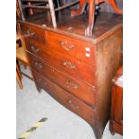 A 19TH CENTURY OAK CHEST WITH TWO SHORT OVER THREE LONG DRAWERS RAISED ON BRACKET FEET.