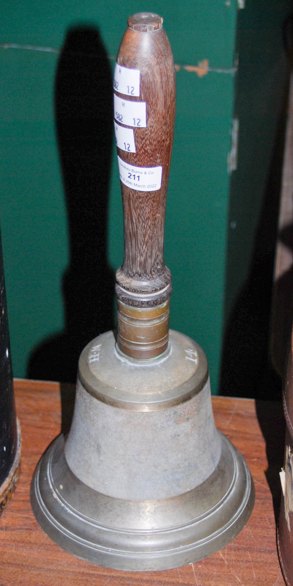 VINTAGE BELL WITH TURNED WOOD HANDLE INSCRIBED 'W. H, 14'.