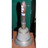 VINTAGE BELL WITH TURNED WOOD HANDLE INSCRIBED 'W. H, 14'.
