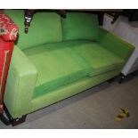 *A TWO SEAT SOFA BY CHARLOTTE JAMES FURNITURE, OF RECTANGULAR FORM, UPHOLSTERED IN GREEN WITH LOOSE
