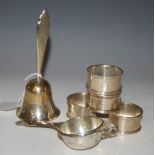 COLLECTION OF SILVER TO INCLUDE FOUR LONDON SILVER NAPKIN RINGS, BIRMINGHAM SILVER TEA STRAINER, AND