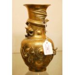 A CHINESE GILT METAL BOTTLE VASE, DECORATED IN RELIEF WITH DRAGONS CONTESTING A FLAMING PEARL, THE