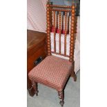 A 19TH CENTURY BOBBIN-TURNED SIDE CHAIR WITH NEEDLEWORK UPHOLSTERED SEAT