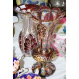 TWO LATE 19TH CENTURY BOHEMIAN CLEAR AND RUBY GLASS OVERLAID GLASS VASES, ONE PEAR-SHAPED WITH WHITE