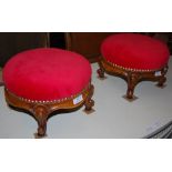 A PAIR OF LATE 19TH CENTURY WALNUT CIRCULAR FOOTSTOOLS WITH RED VELVET UPHOLSTERED TOPS AND BRASS