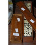 TWO BOXES OF ASSORTED VINTAGE DOMINOES.
