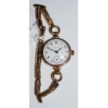 EARLY 20TH CENTURY LADIES YELLOW METAL ROLEX WRISTWATCH, THE DIAL SIGNED 'ROLEX' WITH SECONDARY