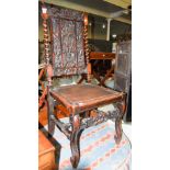 A 19TH CENTURY STAINED OAK HALL CHAIR, THE TOP RAIL CARVED WITH CORONET AND LION ABOVE A PIERCED