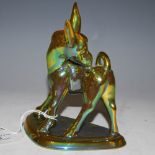 ZSOLNAY PECS OF HUNGARY LUSTRE FIGURE OF A DONKEY, MODELLED ON A TRIANGULAR BASE WITH FACTORY