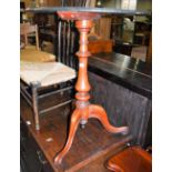 VICTORIAN WALNUT AND BOXWOOD LINED OVAL OCCASIONAL TABLE ON BALUSTER COLUMN AND THREE DOWNSWEPT