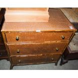 A 20TH CENTURY SIMULATED BAMBOO AND CANEWORK CHEST OF THREE LONG GRADUATED DRAWERS