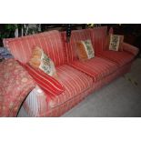 A LARGE COUNTRY HOUSE THREE SEAT SOFA UPHOLSTERED WITH RED AND GOLD STRIPE FABRIC, WITH LOOSE
