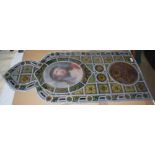 A VICTORIAN STAINED GLASS PANEL, THE CENTRAL ROUNDEL WITH A BUST OF CHRIST WEARING THE CROWN OF