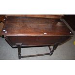 AN 18TH/ 19TH CENTURY OAK DOUGH TROUGH, THE HINGED COVER OPENING TO PLAIN RECESSED INTERIOR ON