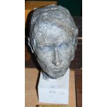 PAINTED PLASTER BUST, HEAD OF A FEMALE ON WHITE RECTANGULAR PLINTH.