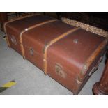 A VINTAGE WOOD AND BRASS BOUND CABIN TRUNK