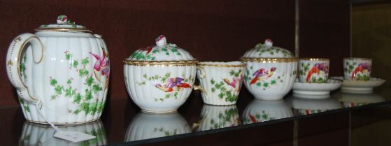 CHELSEA STYLE PORCELAIN PART TEA SET IN THE 18TH CENTURY STYLE, DECORATED WITH HO-HO BIRDS, GOLD