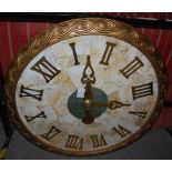 *A LARGE MARBLE WALL CLOCK WITH BRASS ROMAN NUMERAL DETAIL WITHIN GILDED FRAME