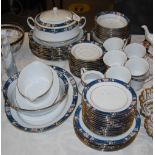 NORITAKE LEGENDARY PRESCOT BLUE, WHITE AND GILT FLORAL DECORATED PART DINNER SET.