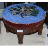A 19TH CENTURY ROSEWOOD VELVET AND BEADWORK UPHOLSTERED CIRCULAR FOOTSTOOL, STAMPED "ALEXR.MACKENZIE