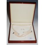 CULTURED PEARL, WHITE METAL AND DIAMOND NECKLACE, BRACELET AND EARRING SET, THE NECKLACE WITH A