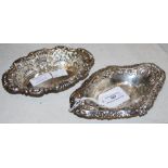 PAIR OF EARLY 20TH CENTURY PIERCED SILVER BONBON/ TRINKET DISHES,ONE OF OVAL FORM WITH EMBOSSED C-
