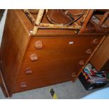 MID-20TH CENTURY TEAK CHEST OF FOUR LONG GRADUATED DRAWERS.