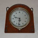 A VINTAGE SMITHS OAK CASED DESK TOP CLOCK, WITH SILVERED ARABIC NUMERAL DIAL