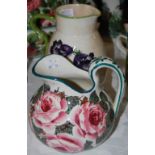 TWO WEMYSS WARE JUGS, INCLUDING ONE DECORATED WITH PINK CABBAGE ROSES, BLACK PAINTED 'WEMYSS, T