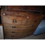 A 19TH CENTURY MAHOGANY BOWFRONT CHEST OF TWO SHORT OVER THREE LONG GRADUATED DRAWERS