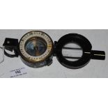 MILITARY ISSUE FIELD COMPASS WITH BLACK AND WHITE PAINTED DETAILS