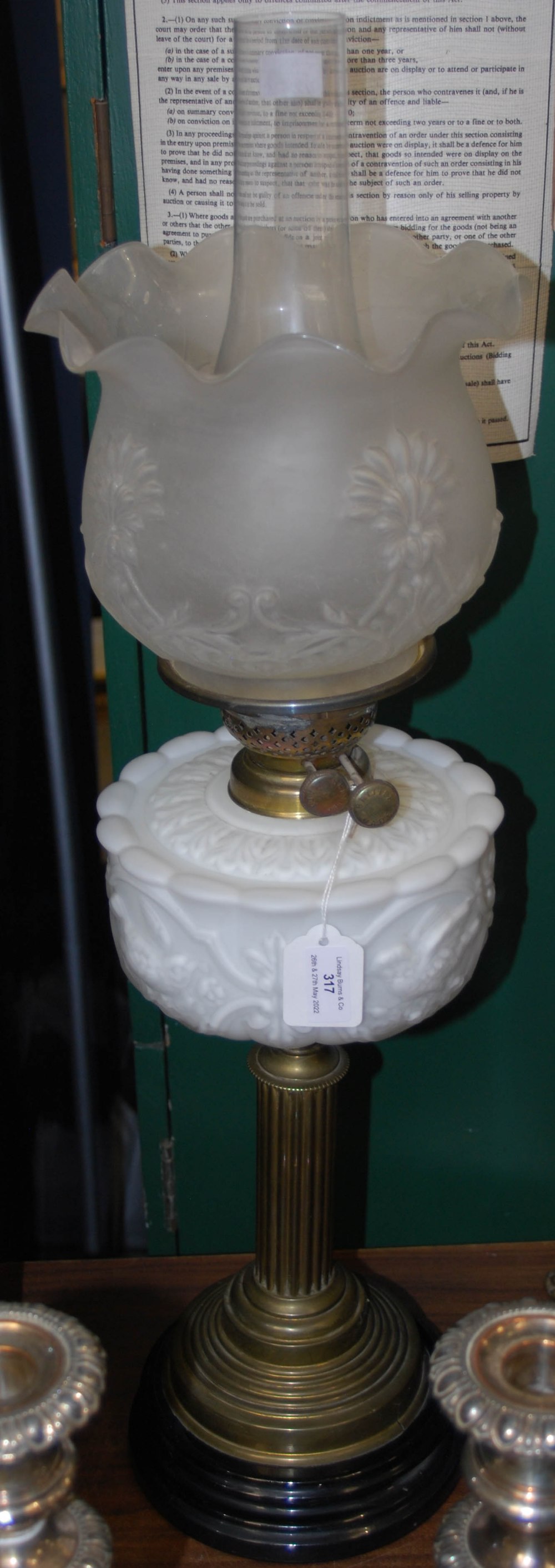 A LATE 19TH CENTURY PARAFFIN BRASS BURNING LAMP WITH OPAQUE GLASS RESERVOIR, FROSTED GLASS SHADE AND