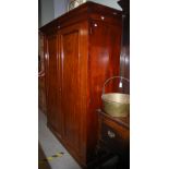 A VICTORIAN MAHOGANY TWO-DOOR WARDROBE