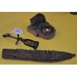 A VINTAGE WHITE METAL CORKSCREW, BLACK FOREST CARVED BEAR ASHTRAY, AND CHINESE CARVED WOOD MODEL